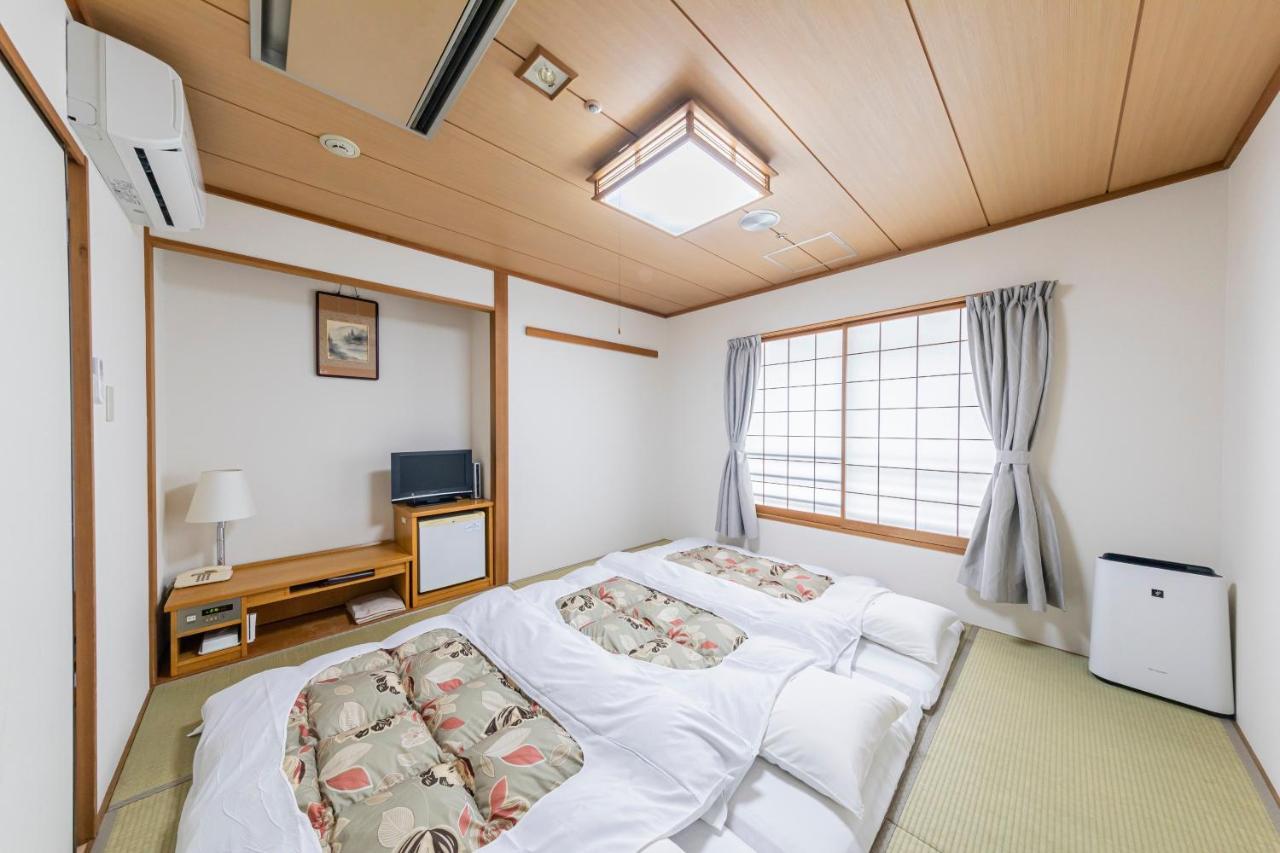 Sunny Stone Hotel Suita Exterior photo