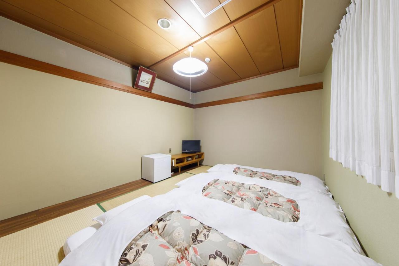 Sunny Stone Hotel Suita Exterior photo